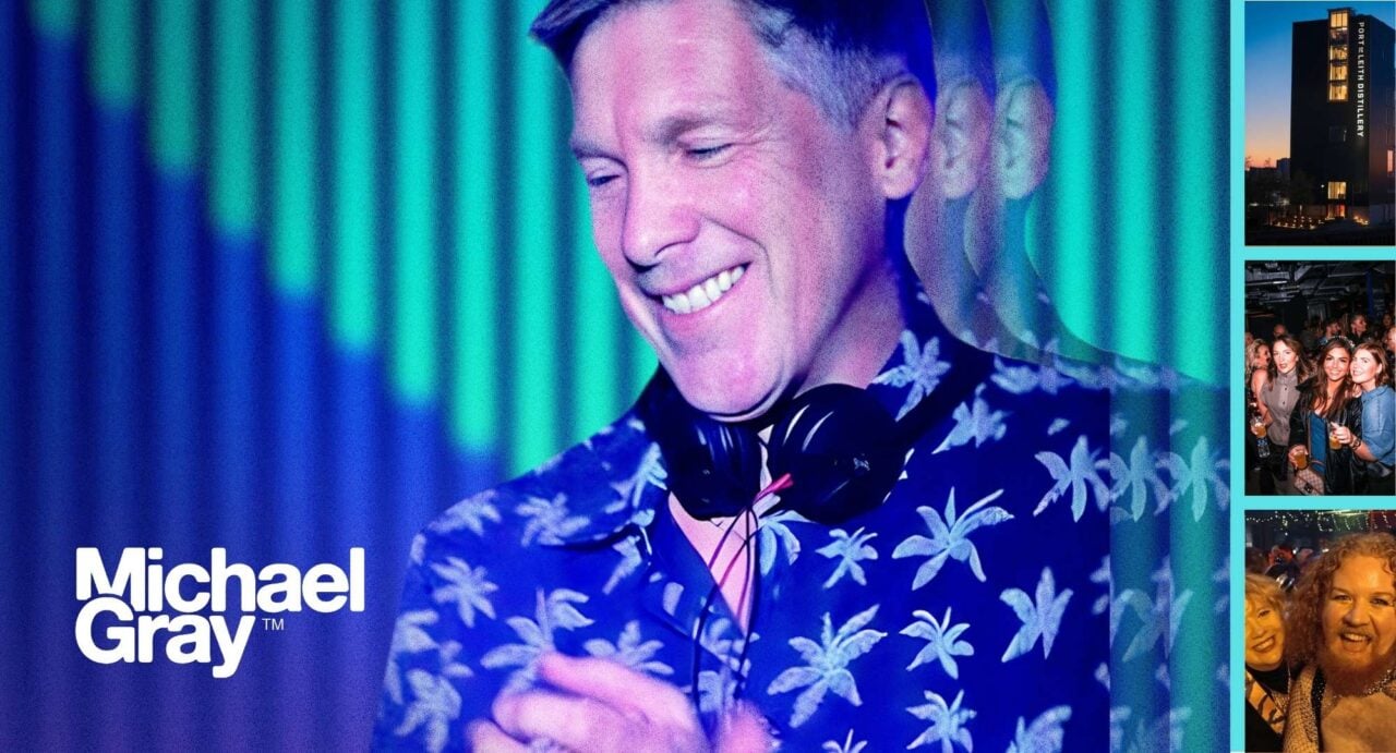 Head and shoulders image of an man wearing headphones.