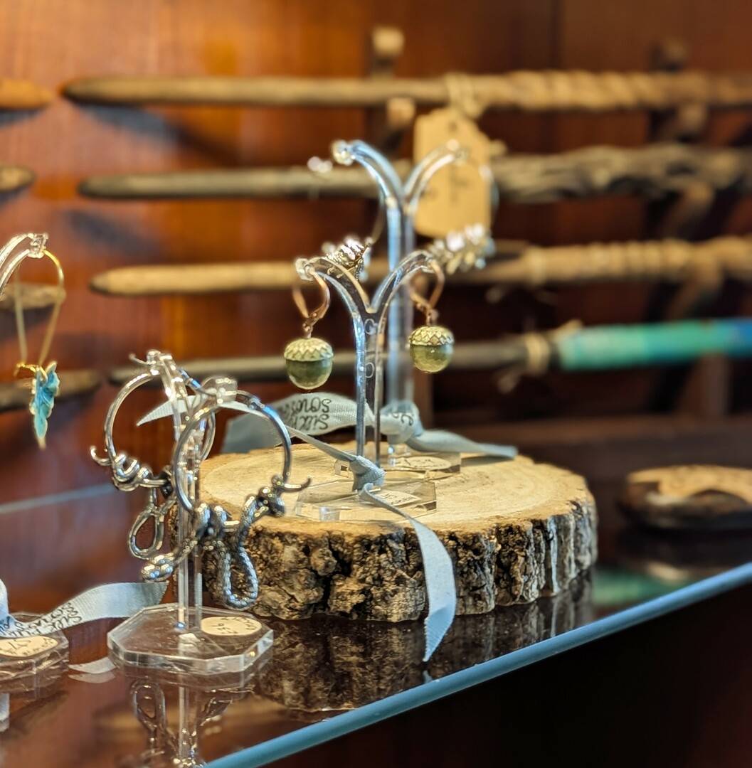 a display of jewellery and hand-made wands.