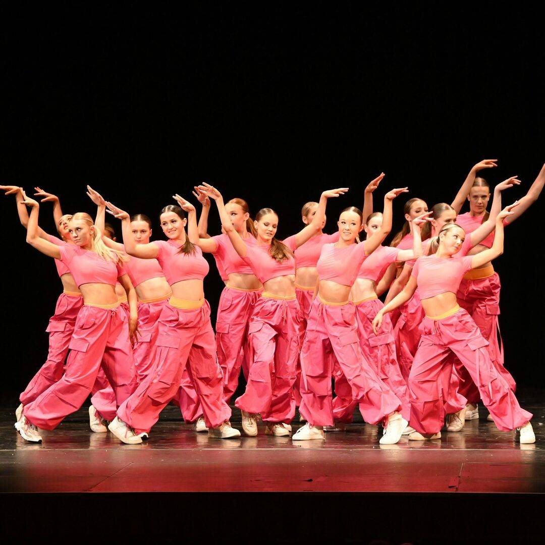 Teenage students taking part in an energetic dance class at DN Dance in Edinburgh, focusing on movement, technique, and confidence-building in a supportive studio environment.,© Copyright 2022 DN Dance (Dynam-nic Dance Limited). Registration No: SC511081
