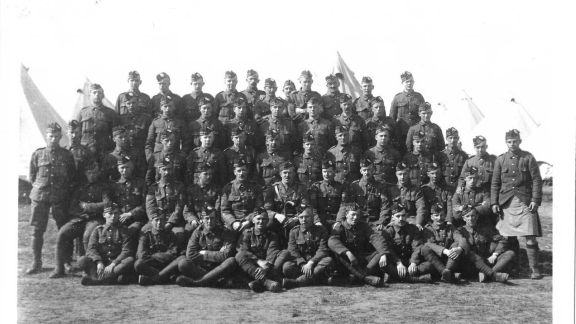 A black and white photo of a group of soldiers.
