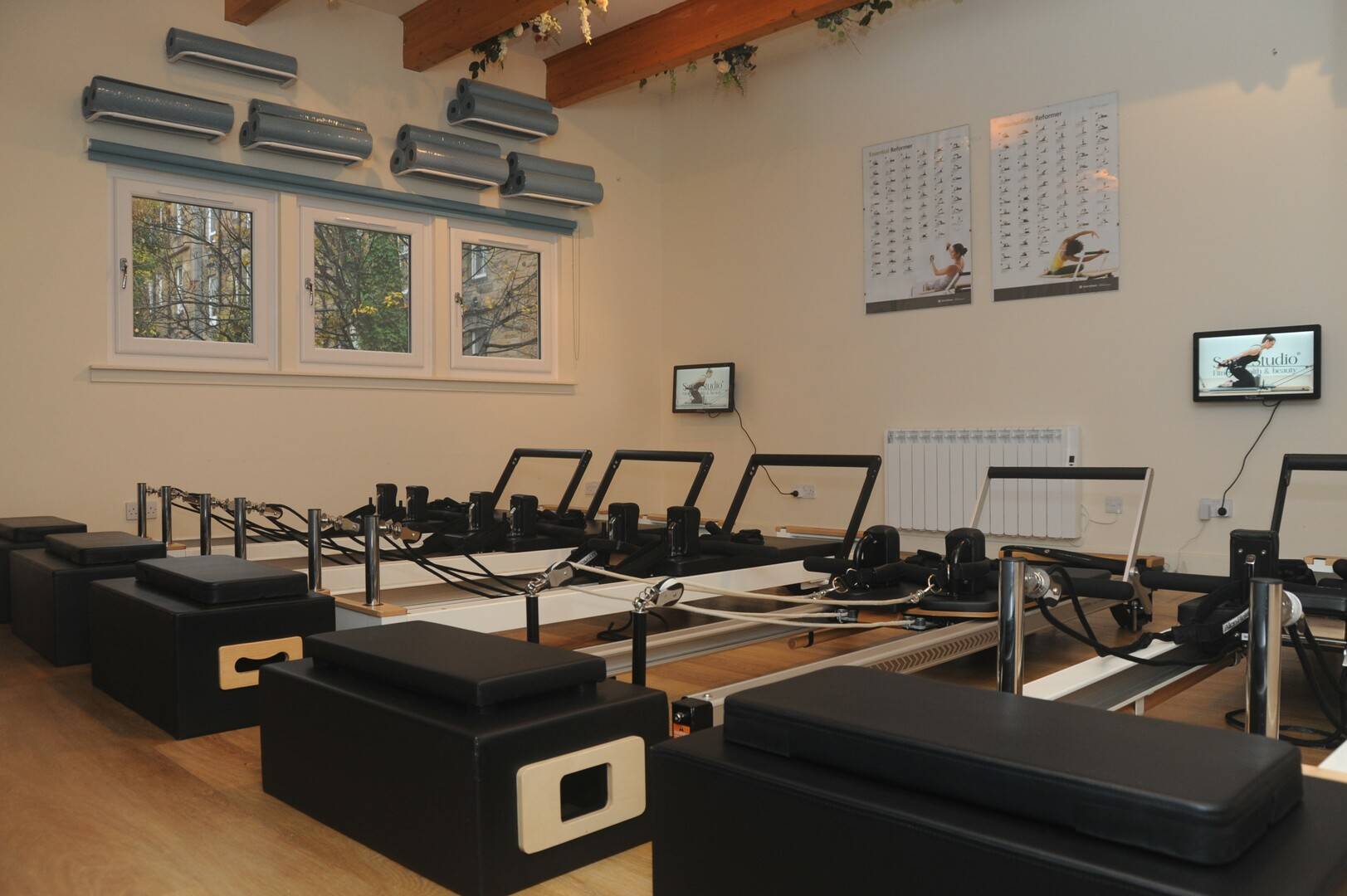 Reformer Pilates studio set up with Reformer equipment,© Owner Sano Studio Ltd