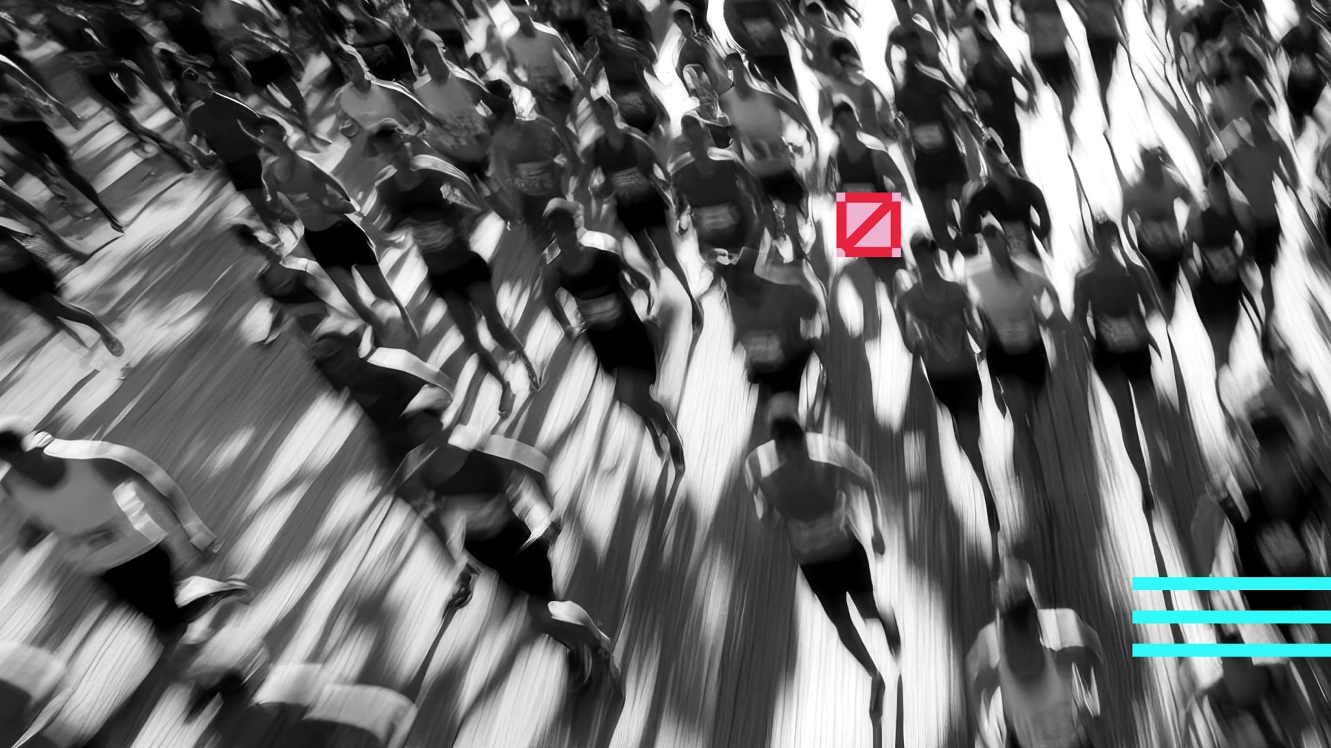 Black and white blurred image of lots of people running in a group.