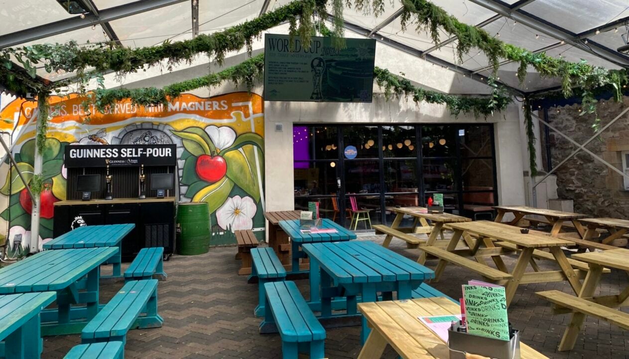 Three Sisters outdoor seating with big screens