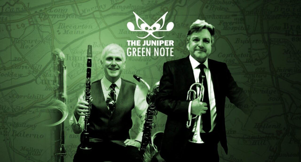 2 men, one holding a clarinet, and the other a trumpet.