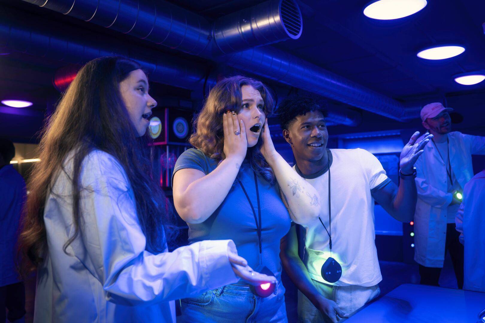 group trying to solve Team Machine escape room problem