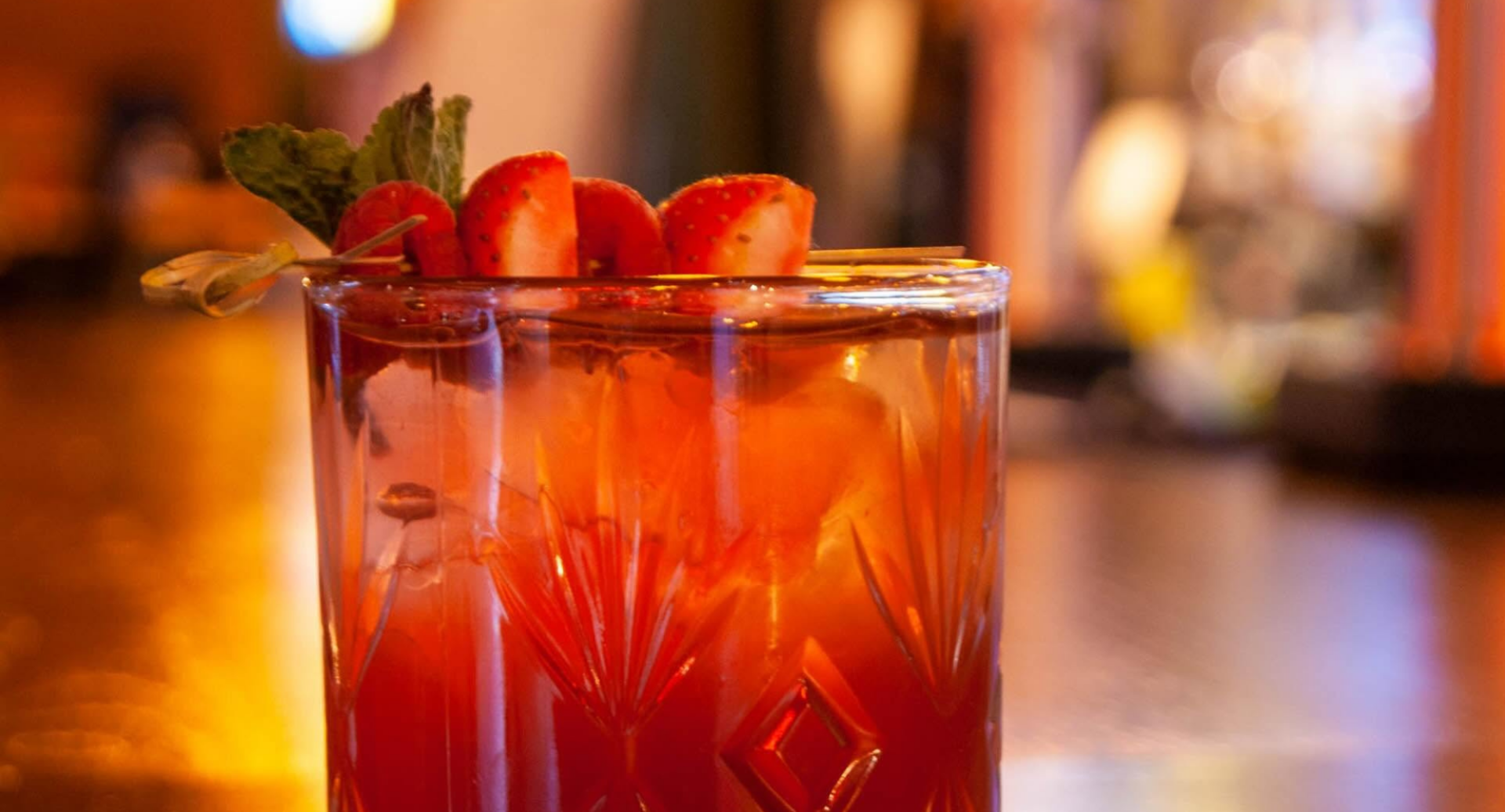 Cocktail with a strawberry garnish,© Old Town Pub Co.