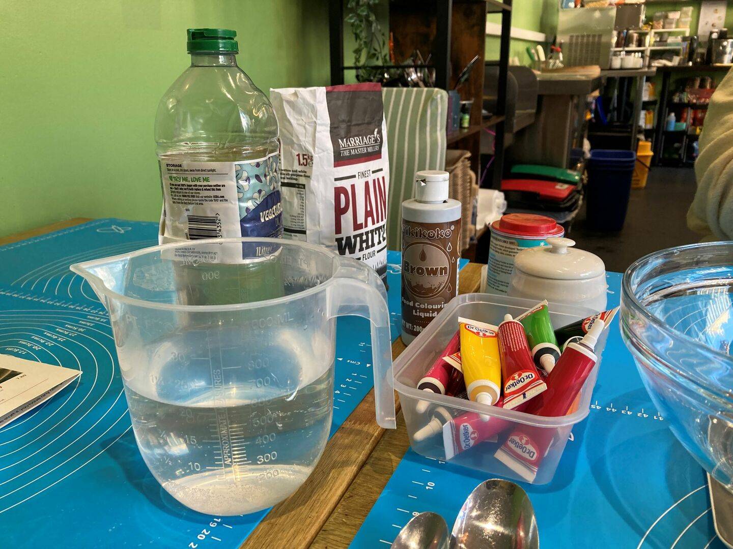A table set up with cooking ingredients.