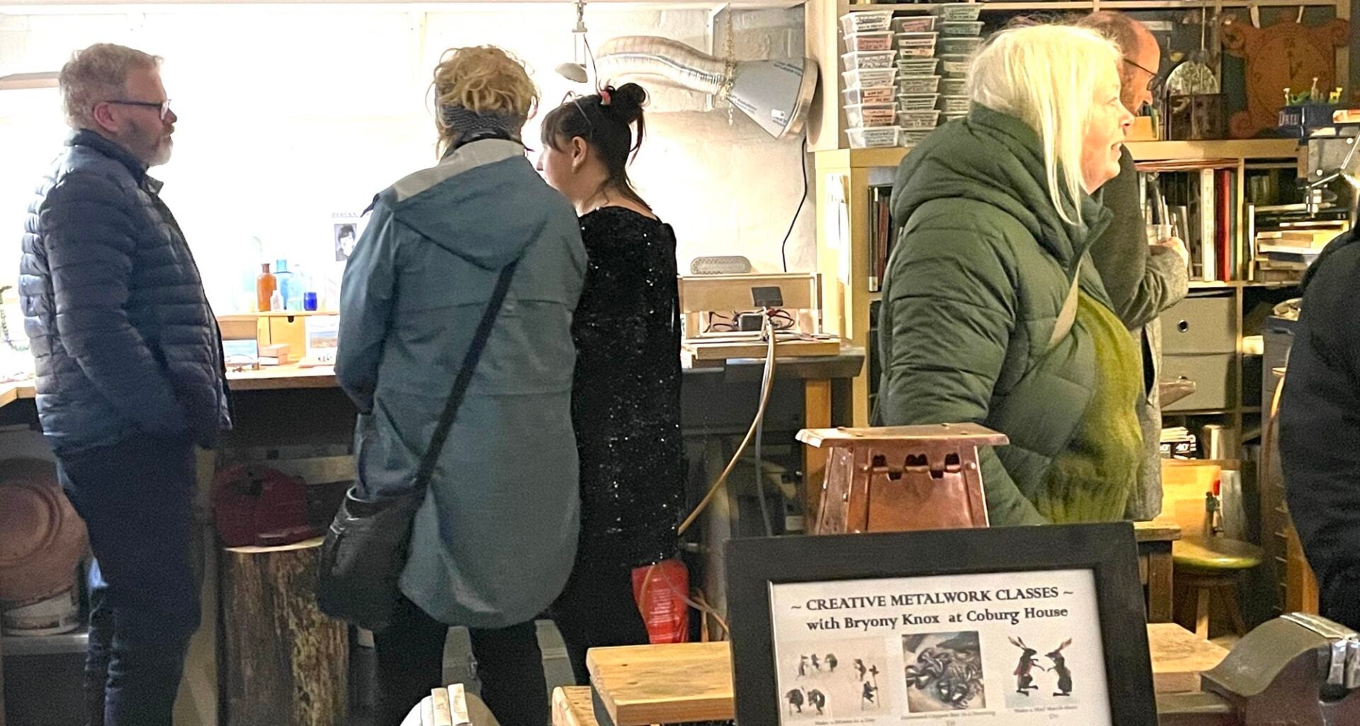Visitors talking to artists at Coburg House Open house