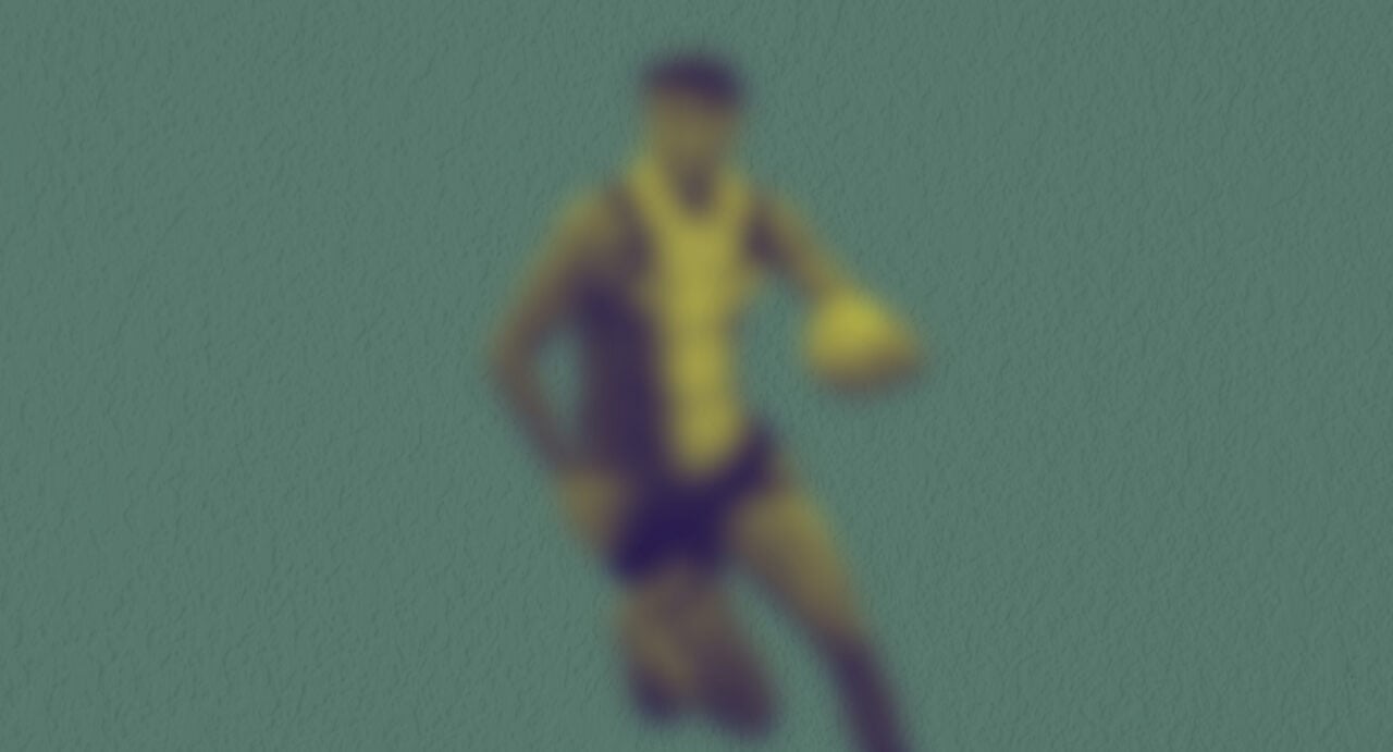 Blurred image of a football player.