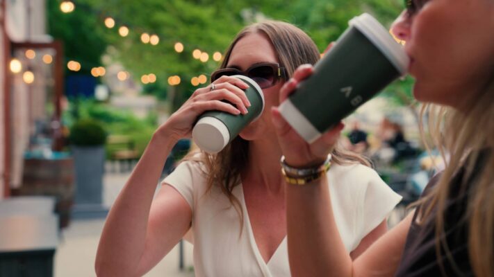 People drinking coffee at the Hatch