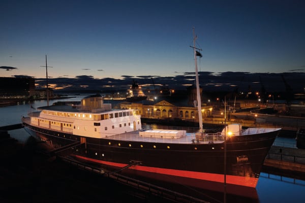 Fingal exterior with Leith shore at night in background