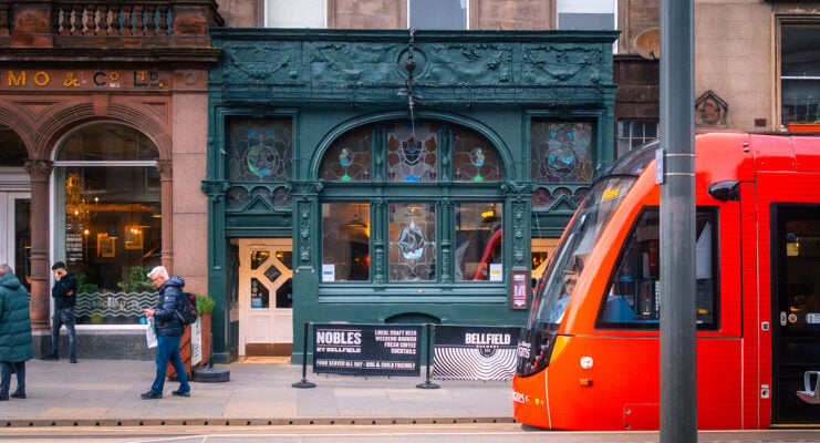 Picture of a tram and Nobles bar
