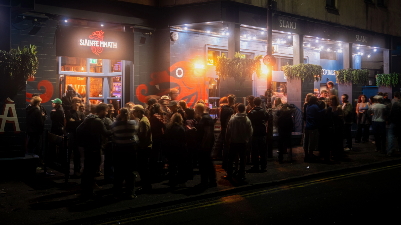 Crowd of people outside of Slainte Mhath on Cowgate.,© Old Town Pub Co