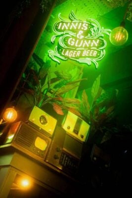 Innis and Gunn neon sign and vintage radios inside Slainte Mhath,© Old Town Pub Co