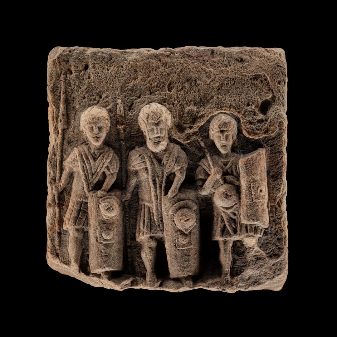 Sandstone sculpture of three legionaries, Croy Hill, 200 - 300 AD. Image