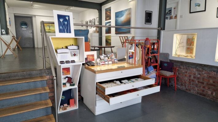 Handmade boxes, textiles, jewellery displayed in box tower and drawers.