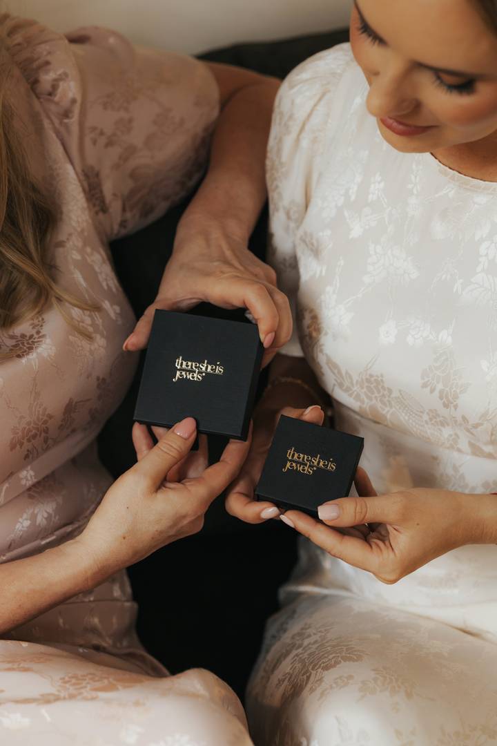 2 ladies holding There she is jewels box