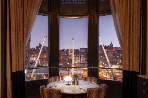 Bay window of Twenty with table looking out to the Old Town