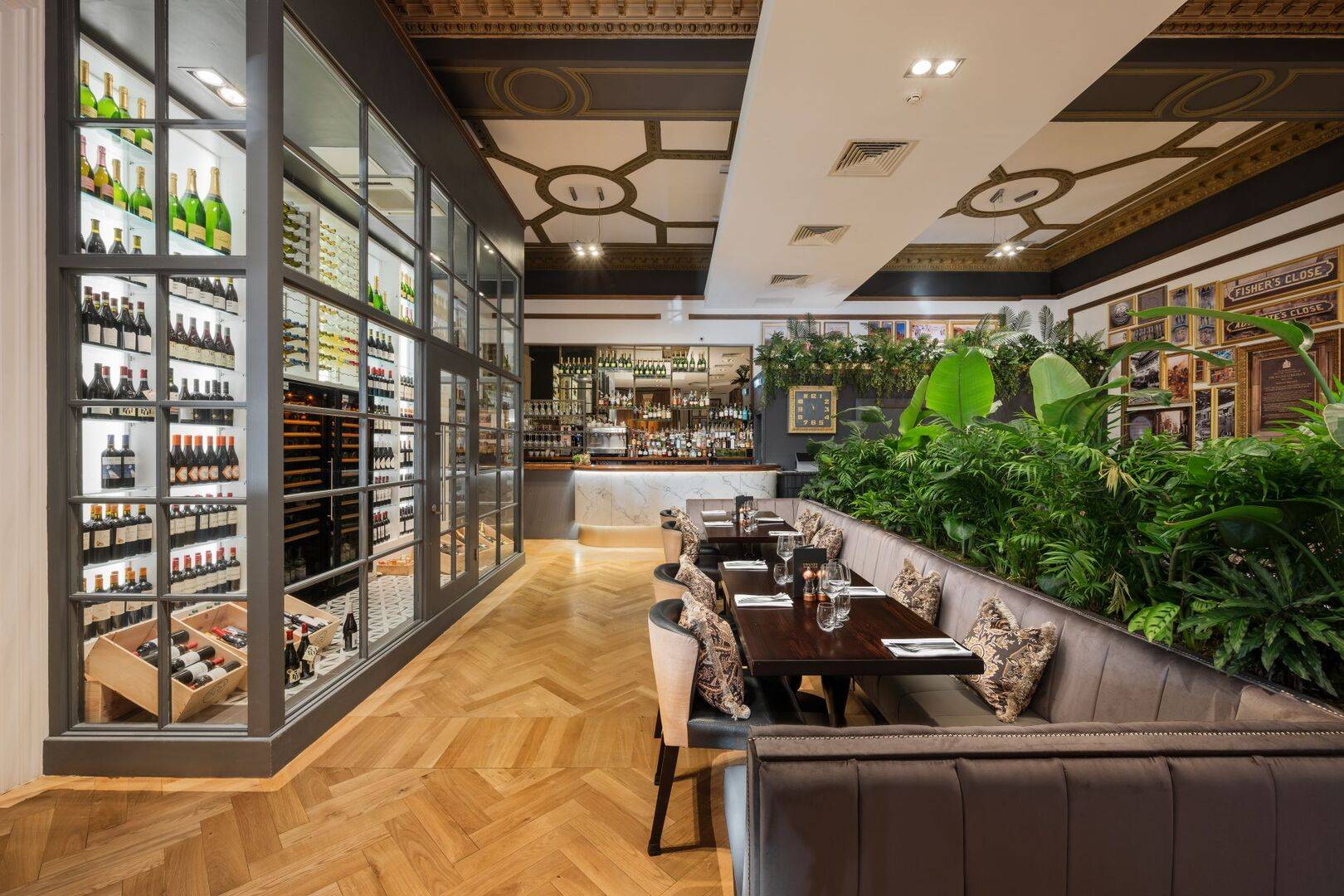 Wide shot of Twenty Princes Street with wine display, bar and tables