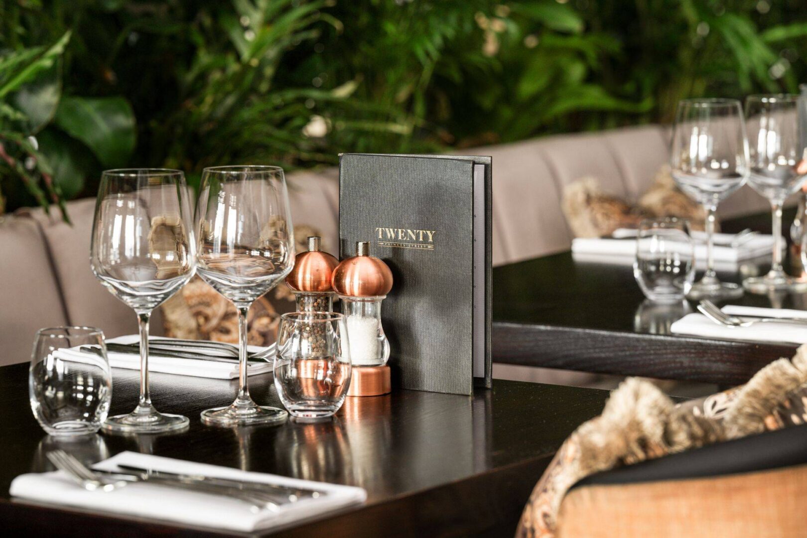 Table setting with menu, 2 wine glasses and 2 water glasses