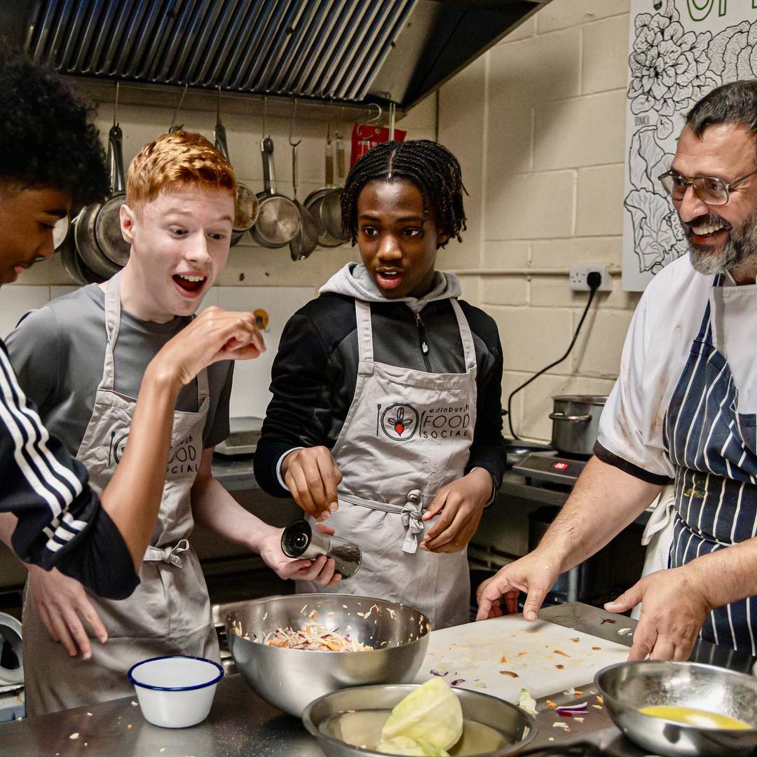 Young adults taking part in cookery class at Edinburgh Food Social